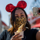 Disney World visitor posing with Dole Whip